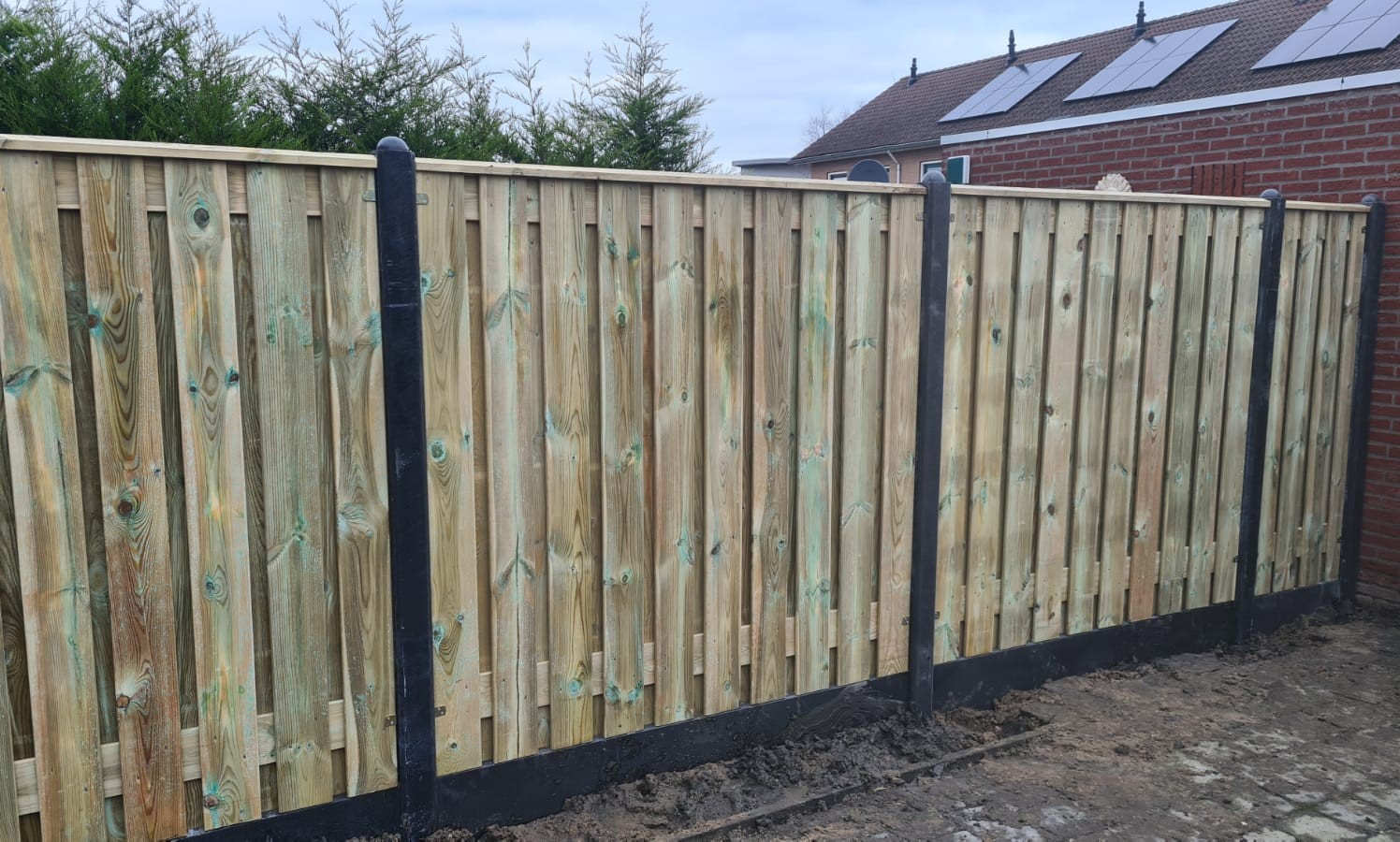 Hout betonschutting